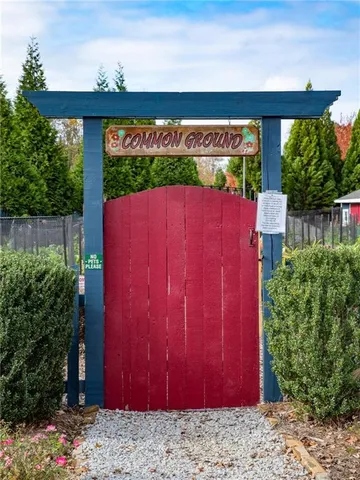 a view of a house with a yard and plants