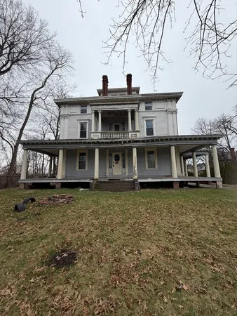 a house view with a garden space