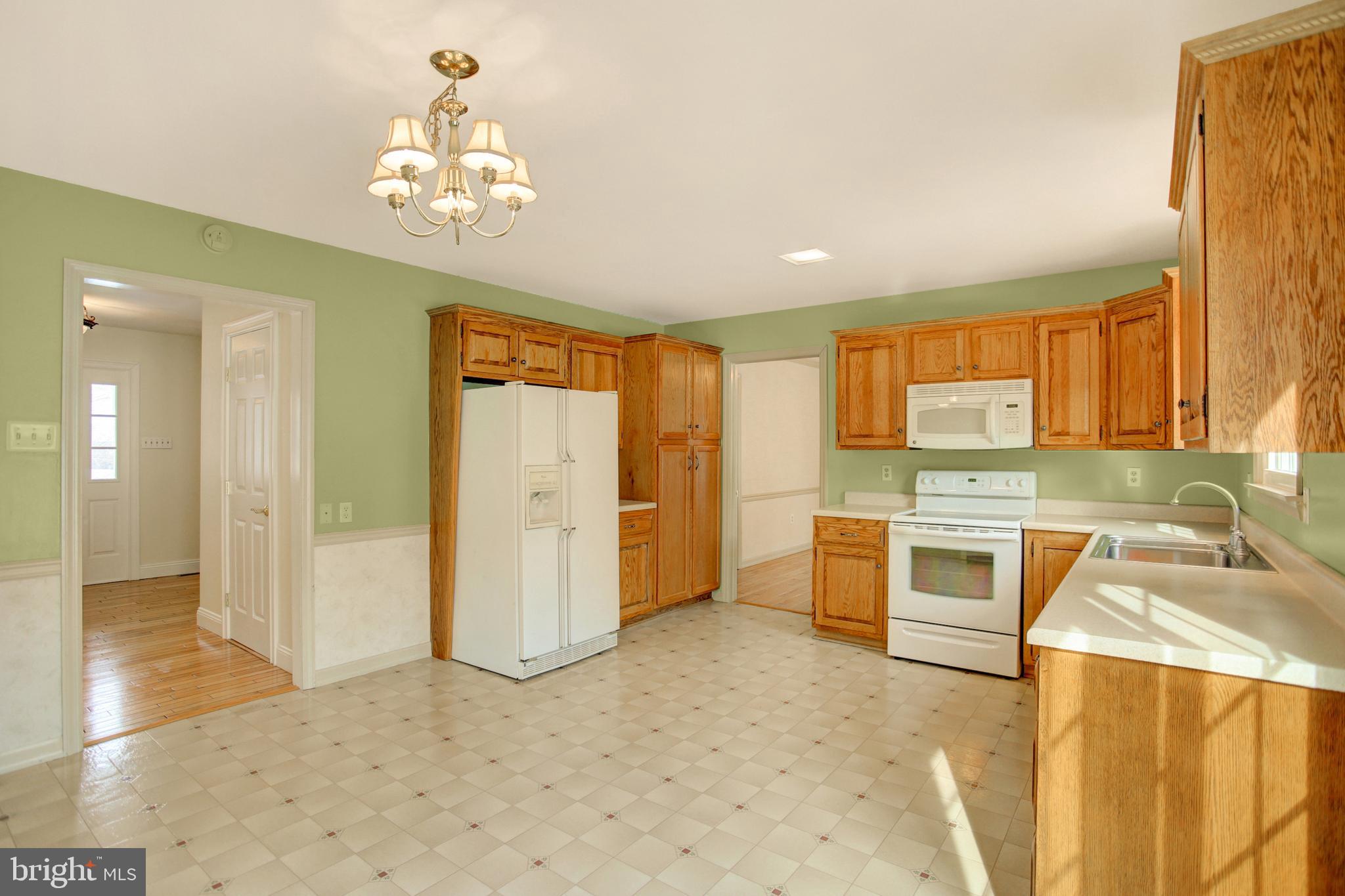202 South Ridge Road Boiling Springs, PA 17007 - Photo 12 of 36 a kitchen that has a lot of cabinets and wooden floor