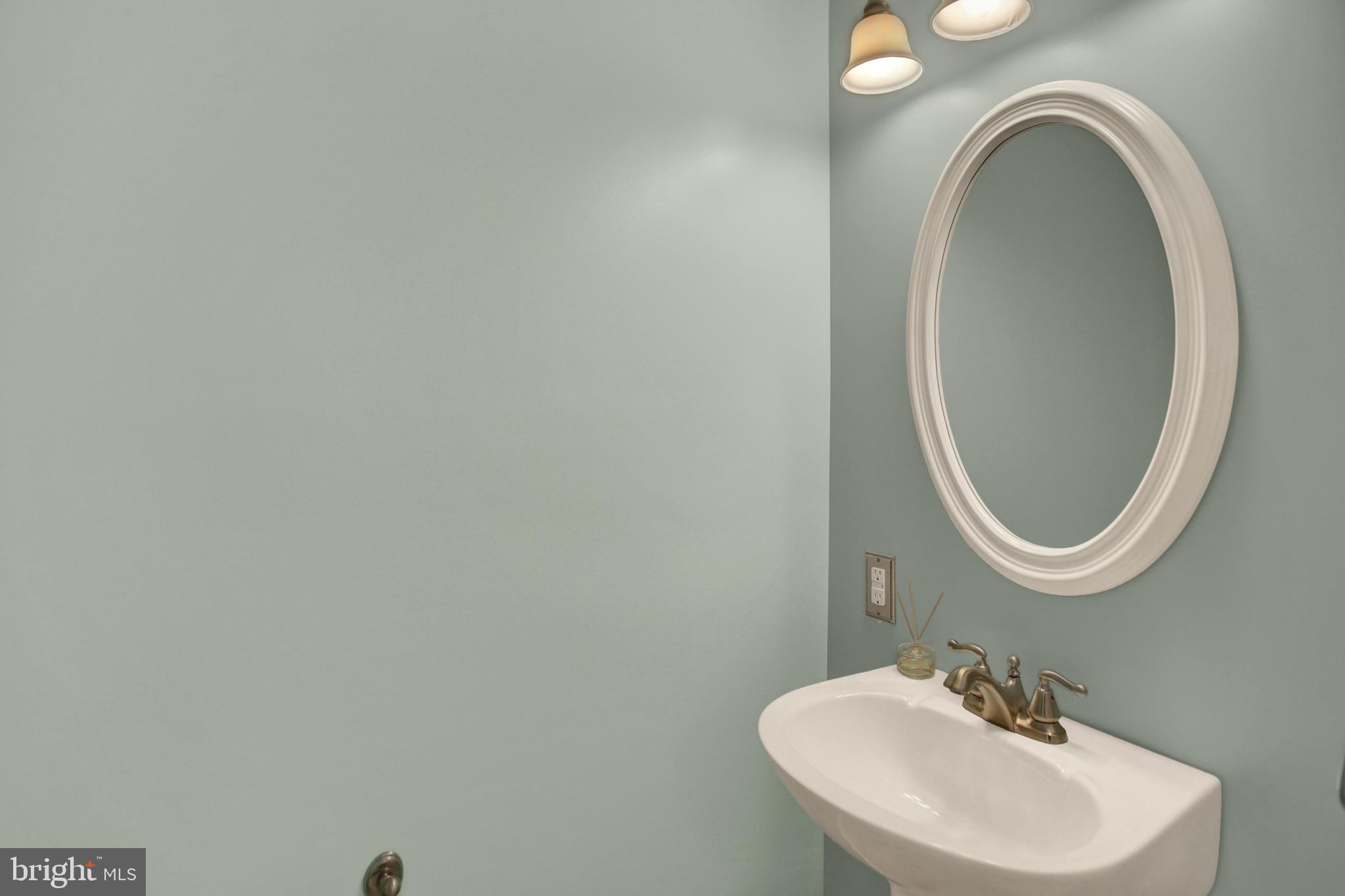 202 South Ridge Road Boiling Springs, PA 17007 - Photo 17 of 36 a bathroom with a sink and a mirror