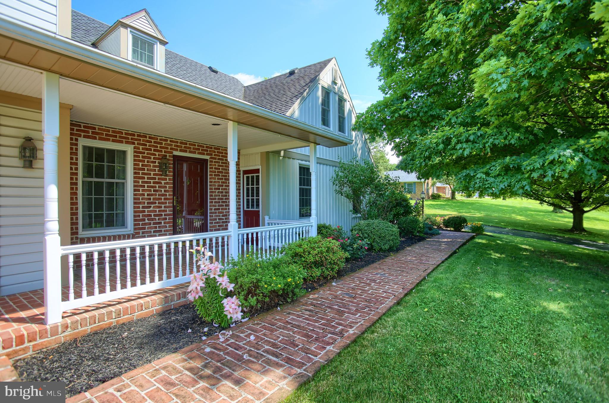 202 South Ridge Road Boiling Springs, PA 17007 - Photo 3 of 36 a view of a house with a yard and flower garden