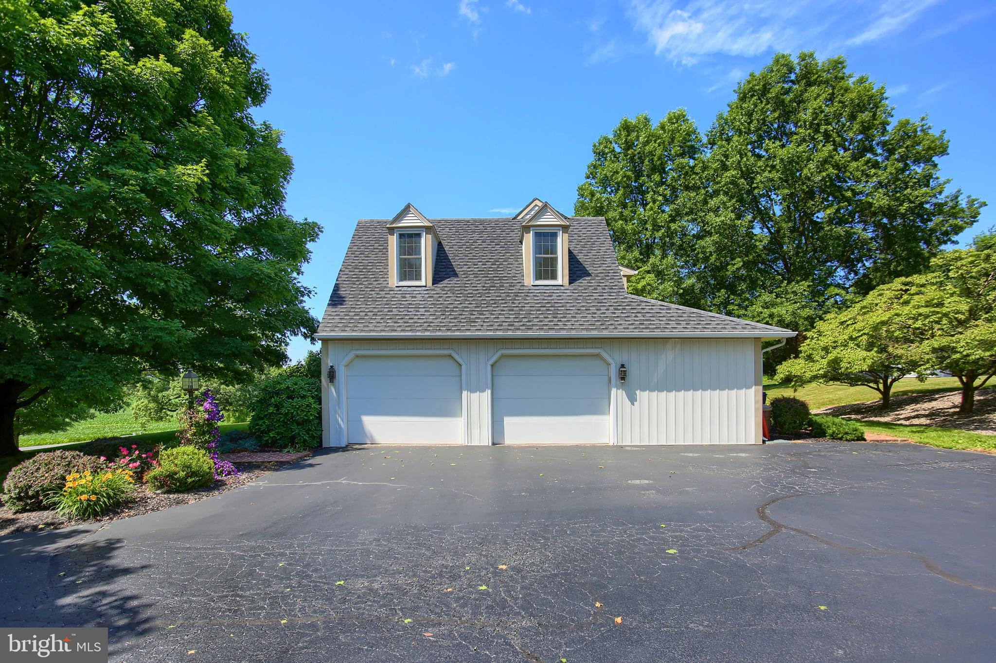 202 South Ridge Road Boiling Springs, PA 17007 - Photo 32 of 36 a front view of a house with a yard and garage