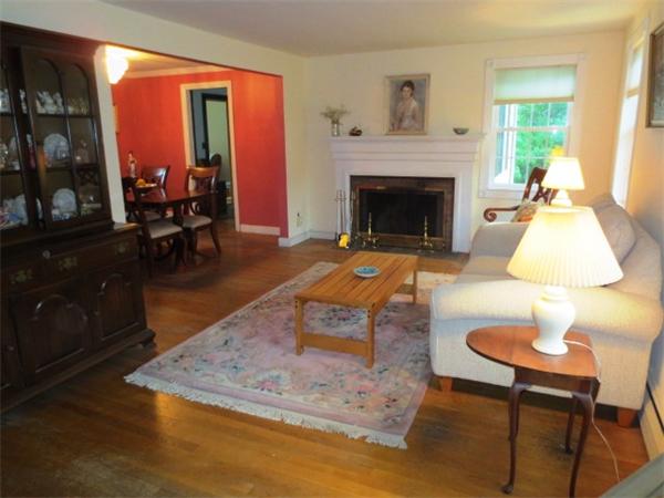 36 Charlesdale Road Medfield, MA 02052 - Photo 5 of 17 a living room with furniture and a fireplace