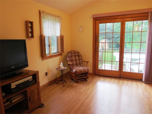 36 Charlesdale Road Medfield, MA 02052 - Photo 10 of 17 a living room with furniture and a flat screen tv