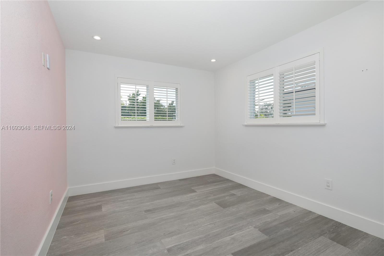 9611 Southwest 59th Terrace Miami, FL 33173 - Photo 21 of 32 an empty room with a window