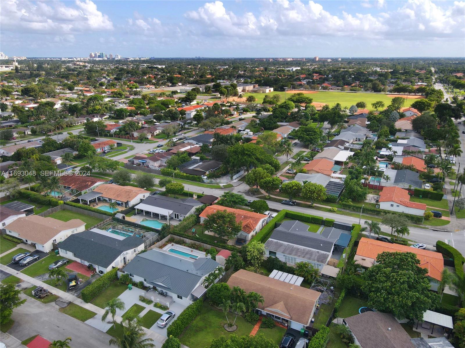 9611 Southwest 59th Terrace Miami, FL 33173 - Photo 31 of 32 an aerial view of residential houses with outdoor space