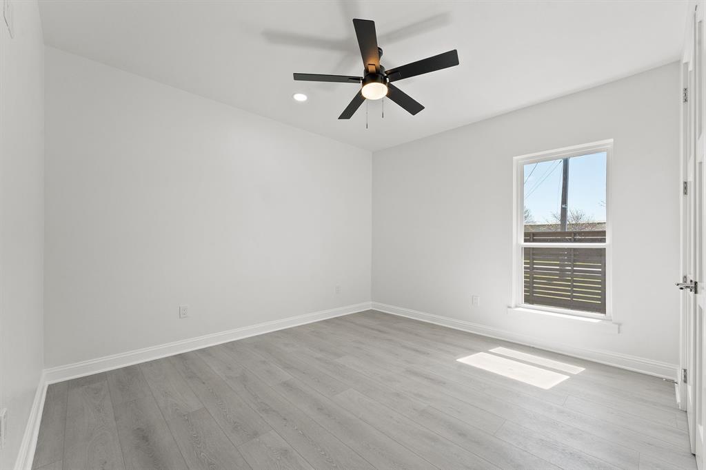 809 South Adelaide Street Terrell, TX 75160 - Photo 10 of 18 a view of an empty room with a window