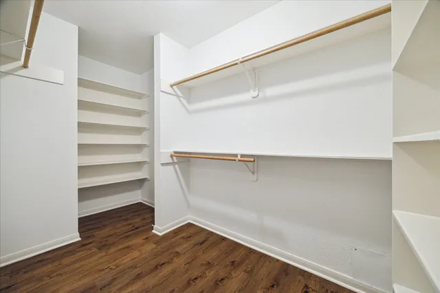 a bathroom with a granite countertop sink mirror and double