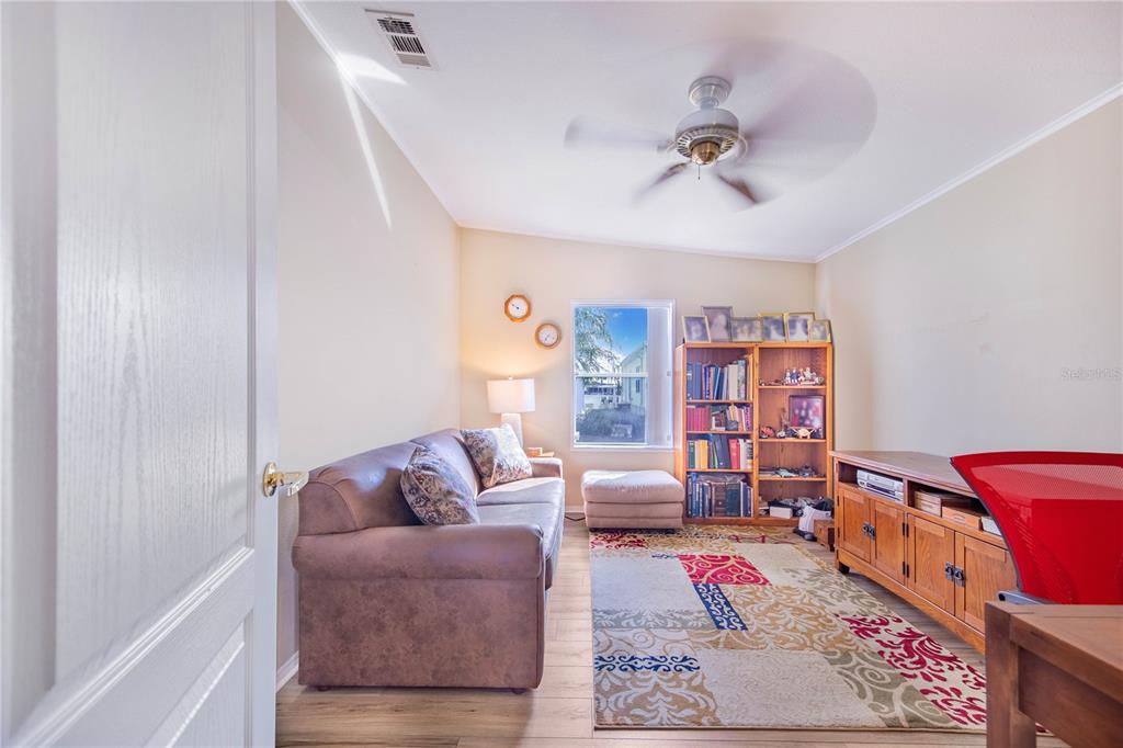332 Fairway Boulevard Frostproof, FL 33843 - Photo 15 of 56 a living room with furniture and a rug