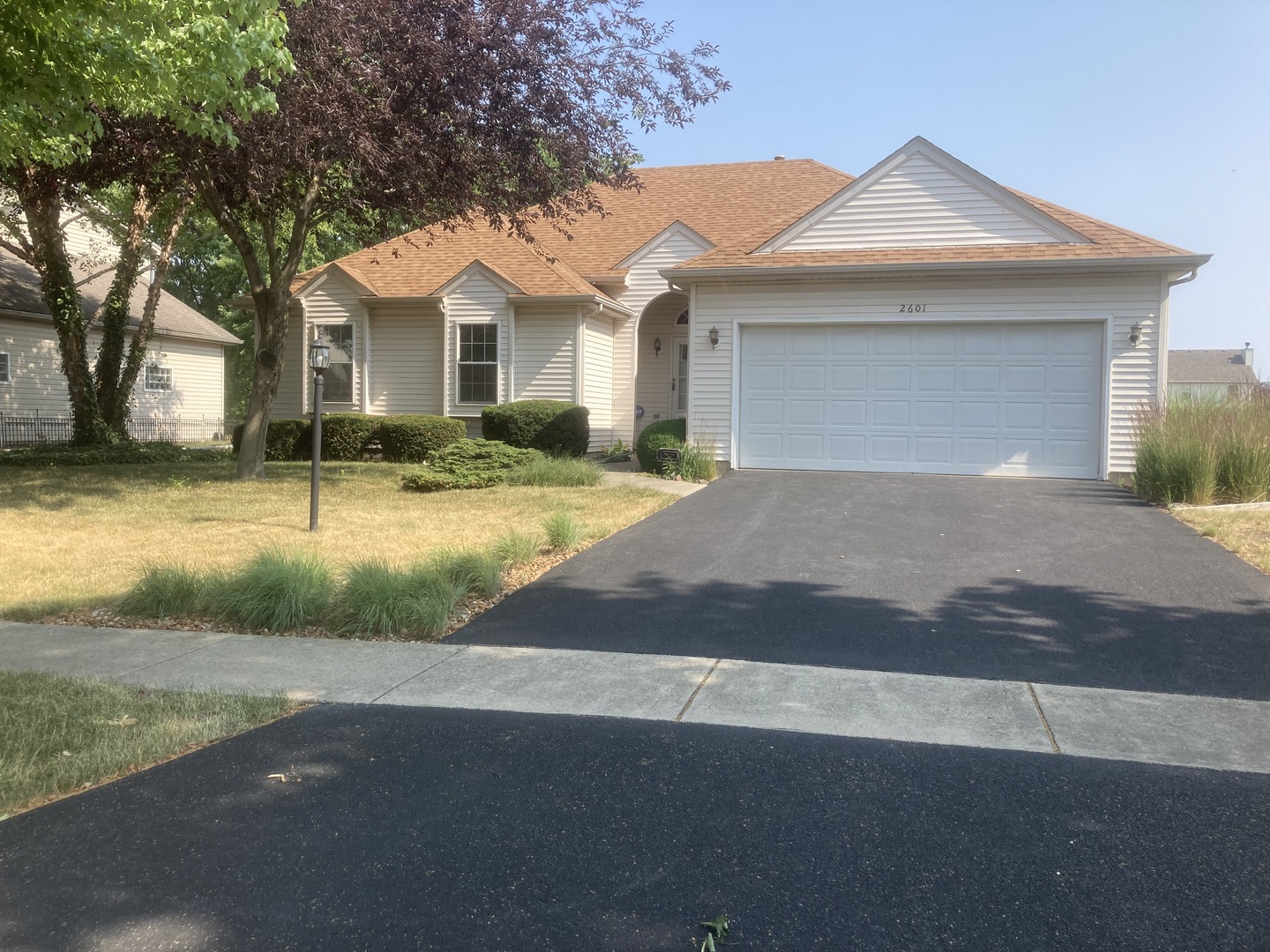 Undisclosed Address Joliet, IL 60435 - Photo 1 of 20 a front view of a house with a yard