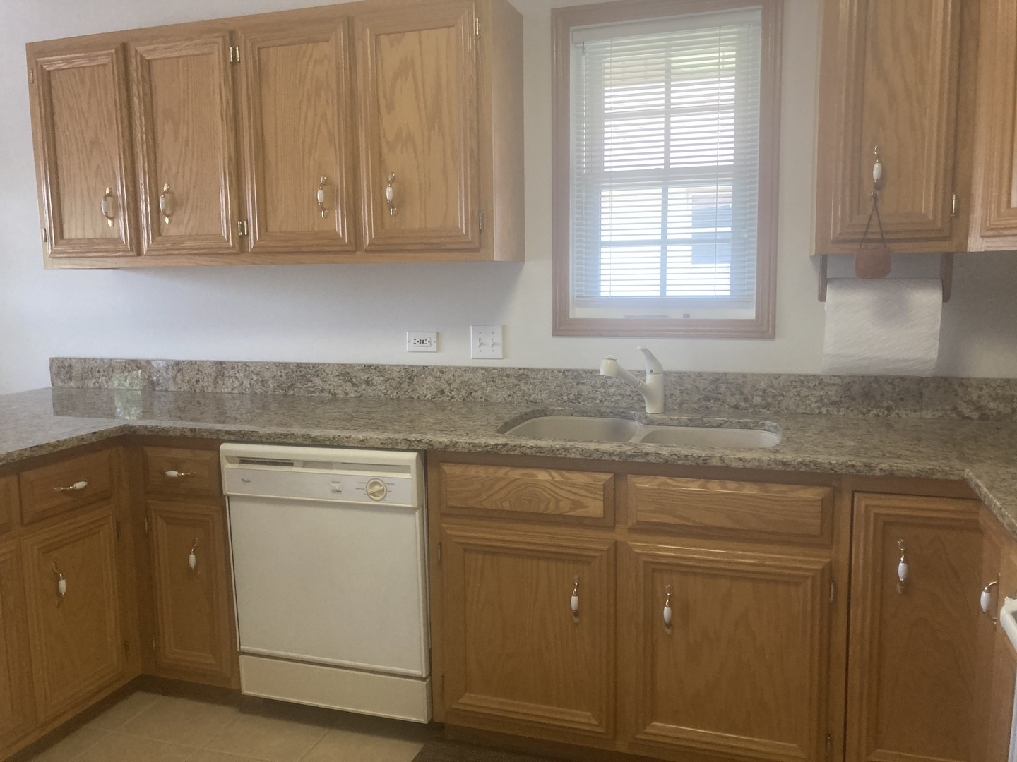 Undisclosed Address Joliet, IL 60435 - Photo 5 of 20 a kitchen with stainless steel appliances granite countertop cabinets and window