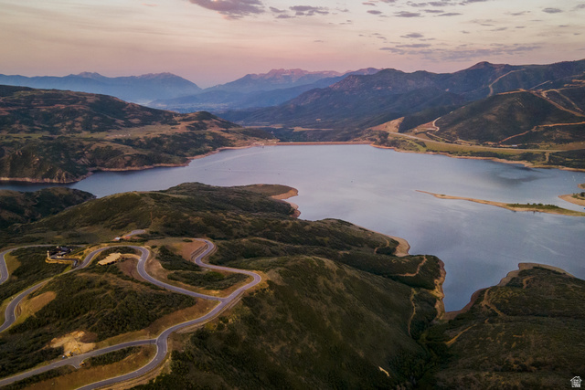 9269 North Sunset Road Kamas, UT 84036 - Photo 15 of 21 Expansive mountain landscape featuring a large lake, winding roads, and distant peaks