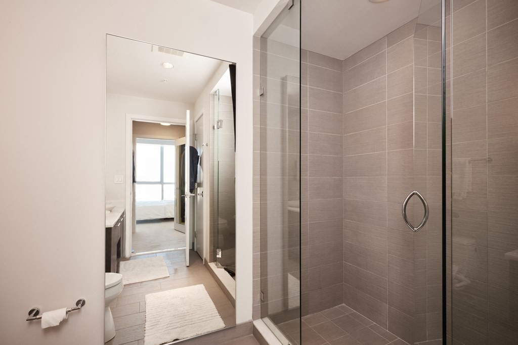 110 Stuart Street, Unit 26F Boston, MA 02116 - Photo 15 of 24 a bathroom with a shower and a sink