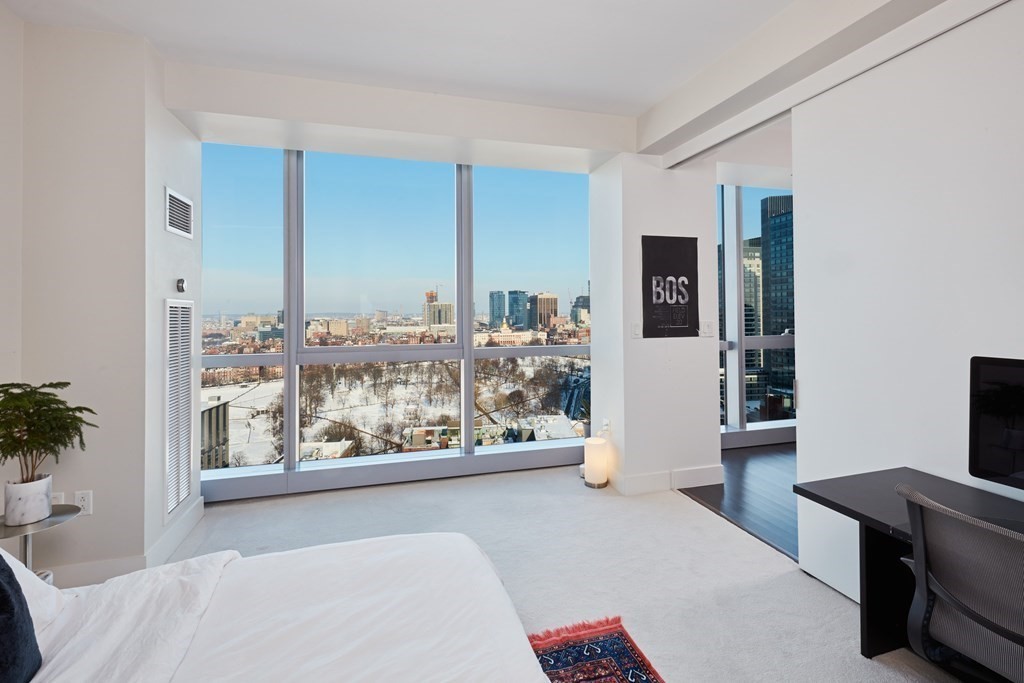 110 Stuart Street, Unit 26F Boston, MA 02116 - Photo 10 of 24 a living room with furniture and painting on the wall