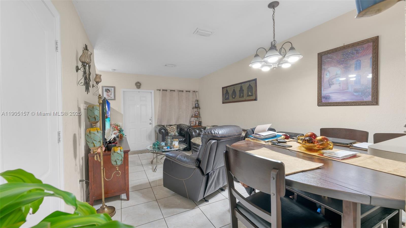 2993 West 80th Street, Unit 29 Hialeah, FL 33018 - Photo 9 of 21 a view of a dining room with furniture