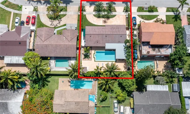 an aerial view of houses and roads