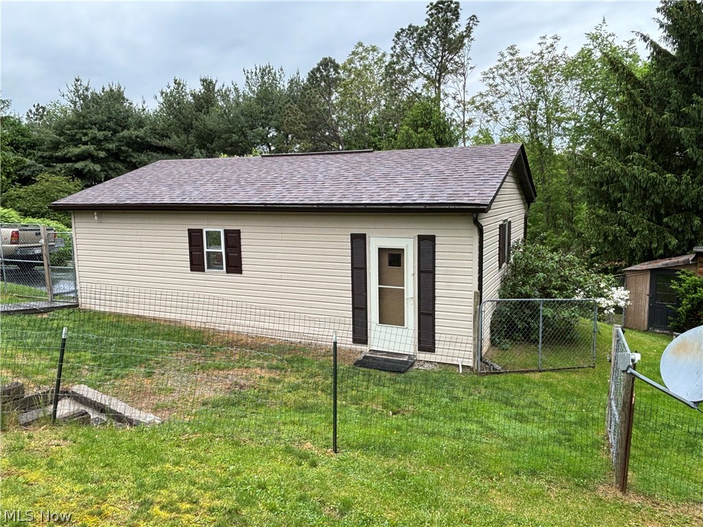 2417 Mc Adoo Ridge Road Wellsburg, WV 26070 - Photo 25 of 33 Rear view of house with a yard