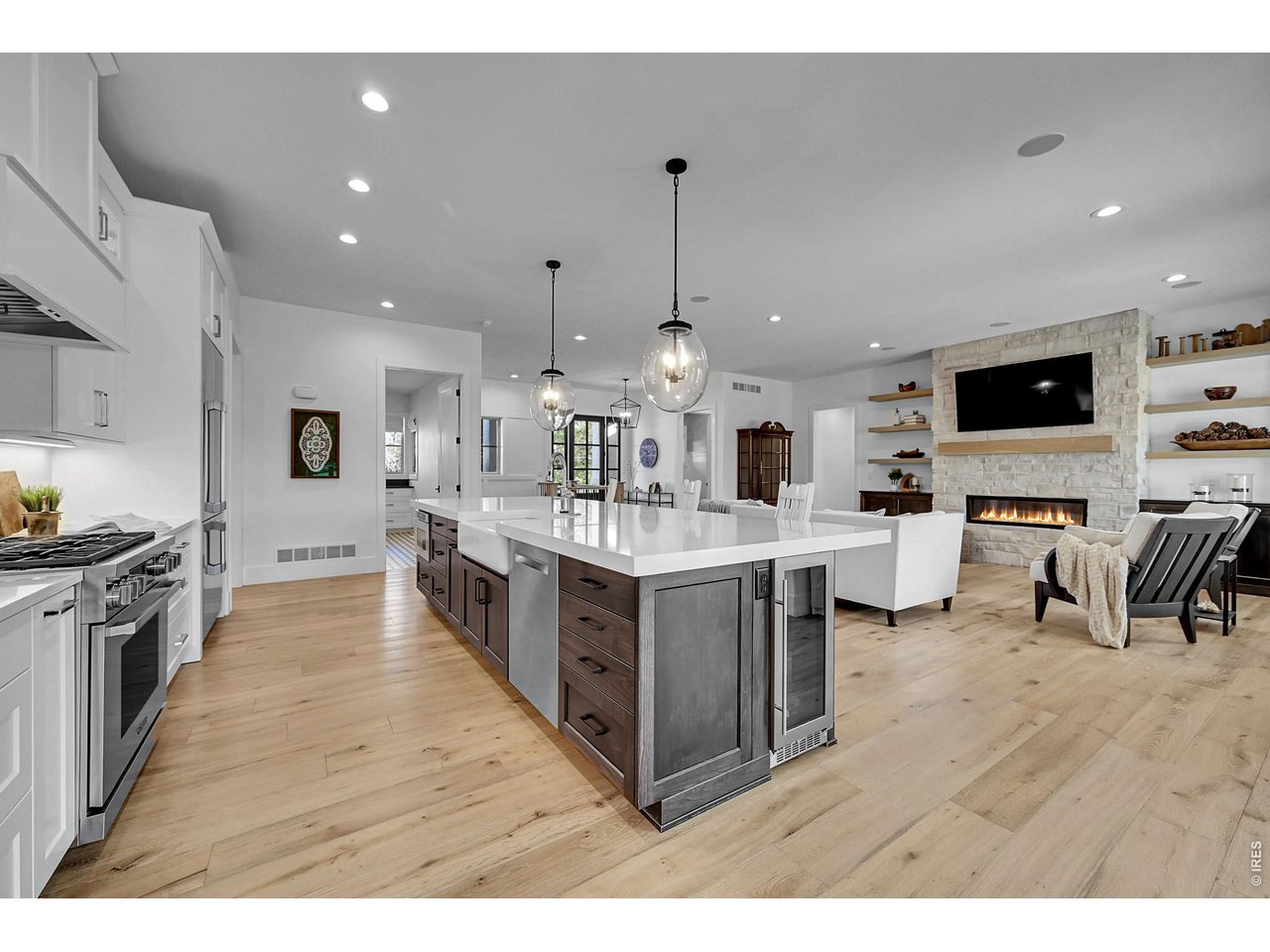 6582 Rookery Road Fort Collins, CO 80528 - Photo 11 of 50 Built-in bar refrigerator, large kitchen island