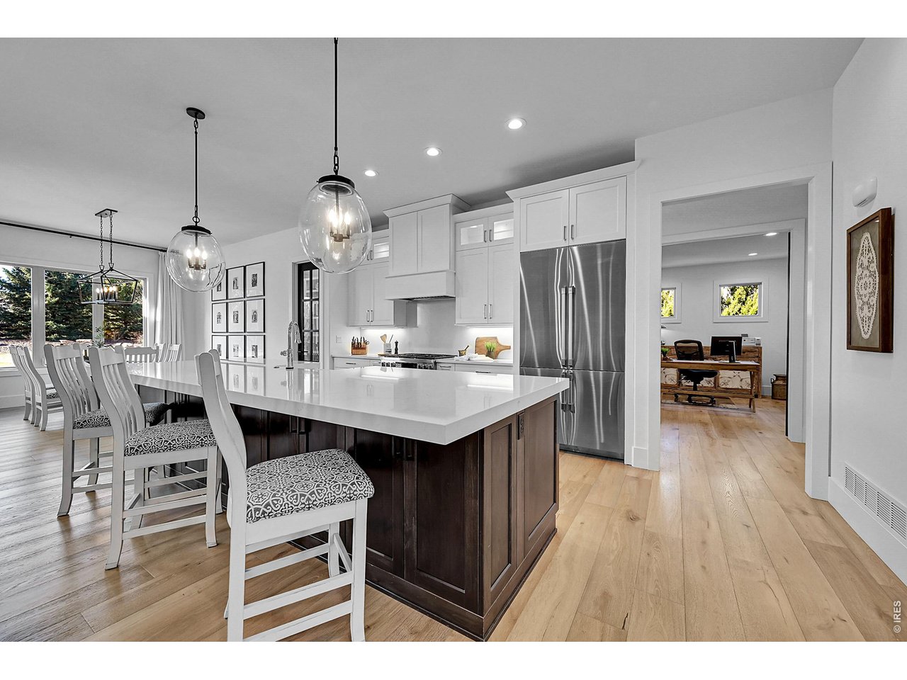 6582 Rookery Road Fort Collins, CO 80528 - Photo 9 of 50 Quartz countertops, backsplash and oversized island