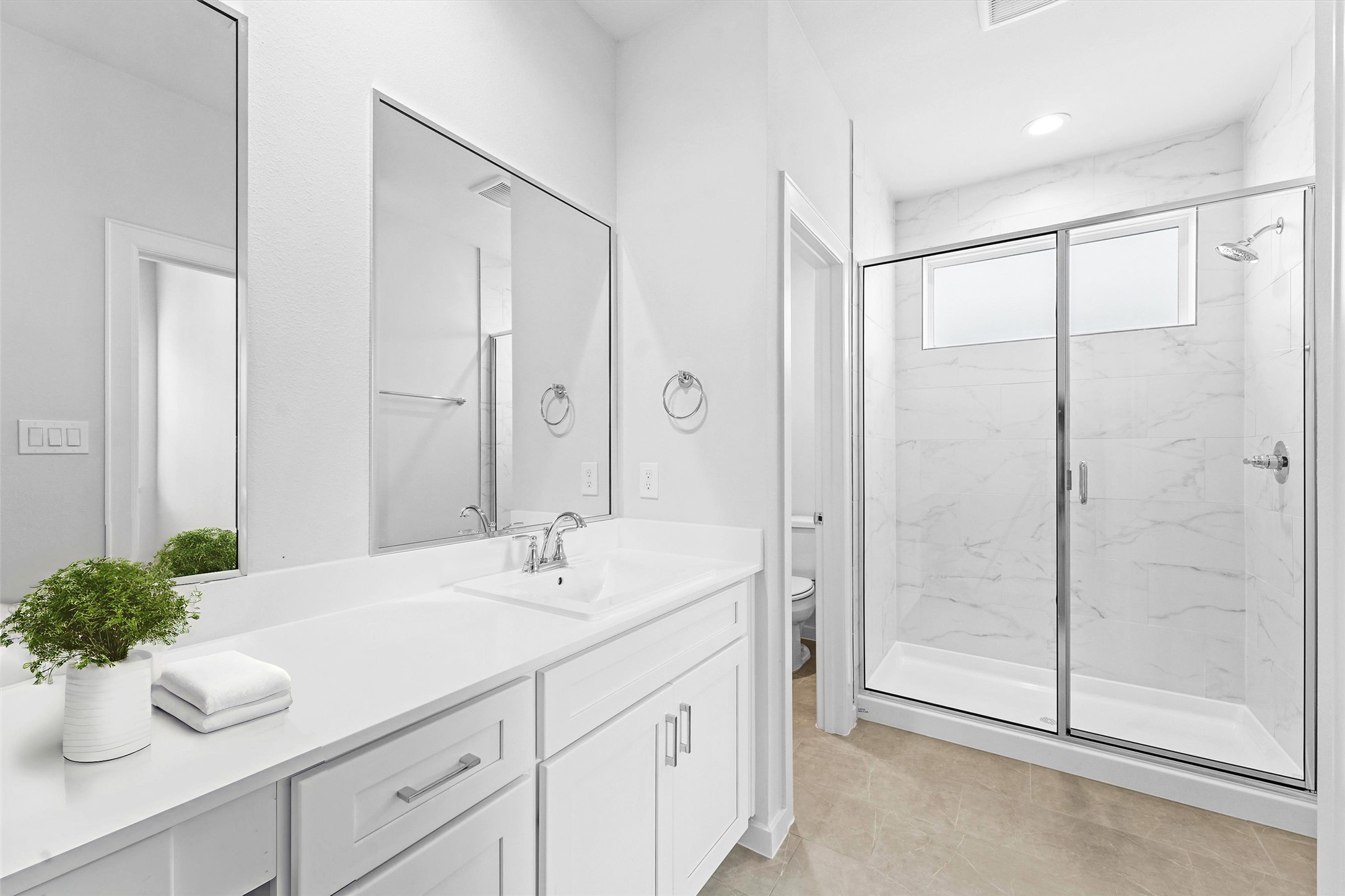 2110 Dewalt Street, Unit HG Houston, TX 77088 - Photo 12 of 22 a spacious bathroom with a shower sink and mirror