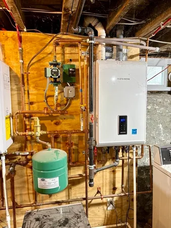 a bathroom with a mirror and shower