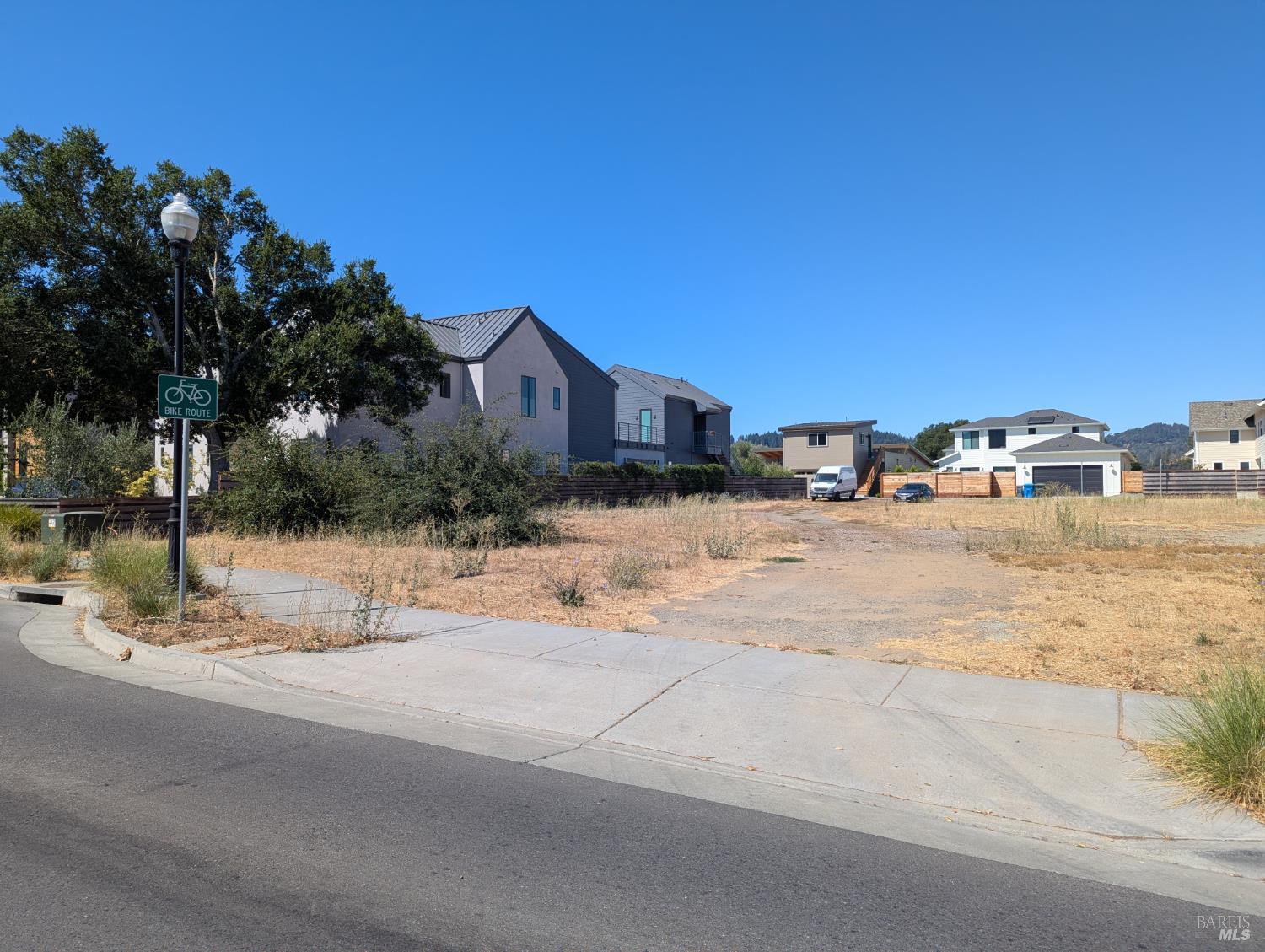 1001 Grove Street Healdsburg, CA 95448 - Photo 6 of 11 a view of large house with a snow on the road