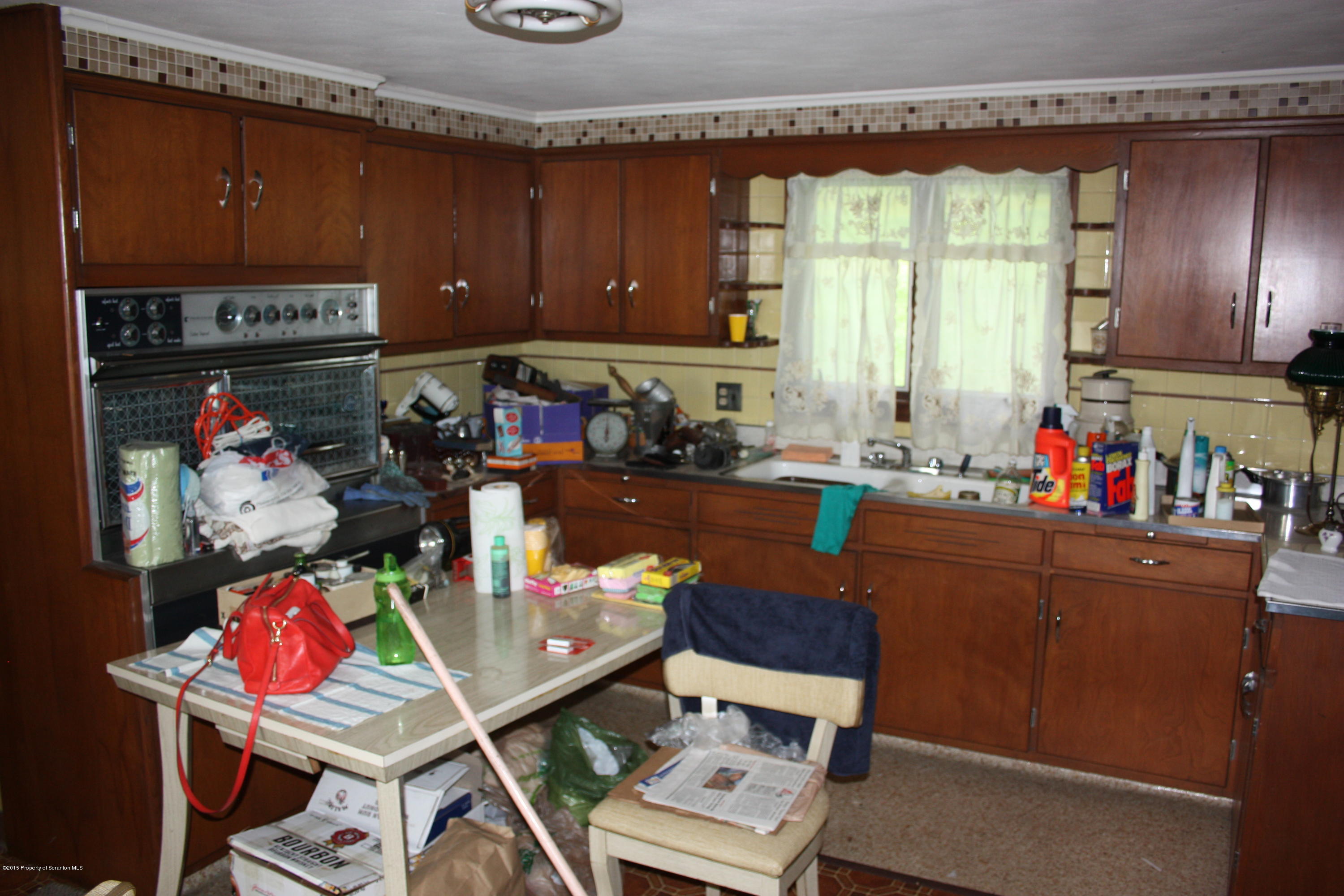 River Road Thornhurst, PA 18424 - Photo 3 of 8 a room with furniture and a fireplace