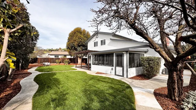a view of a house with a street