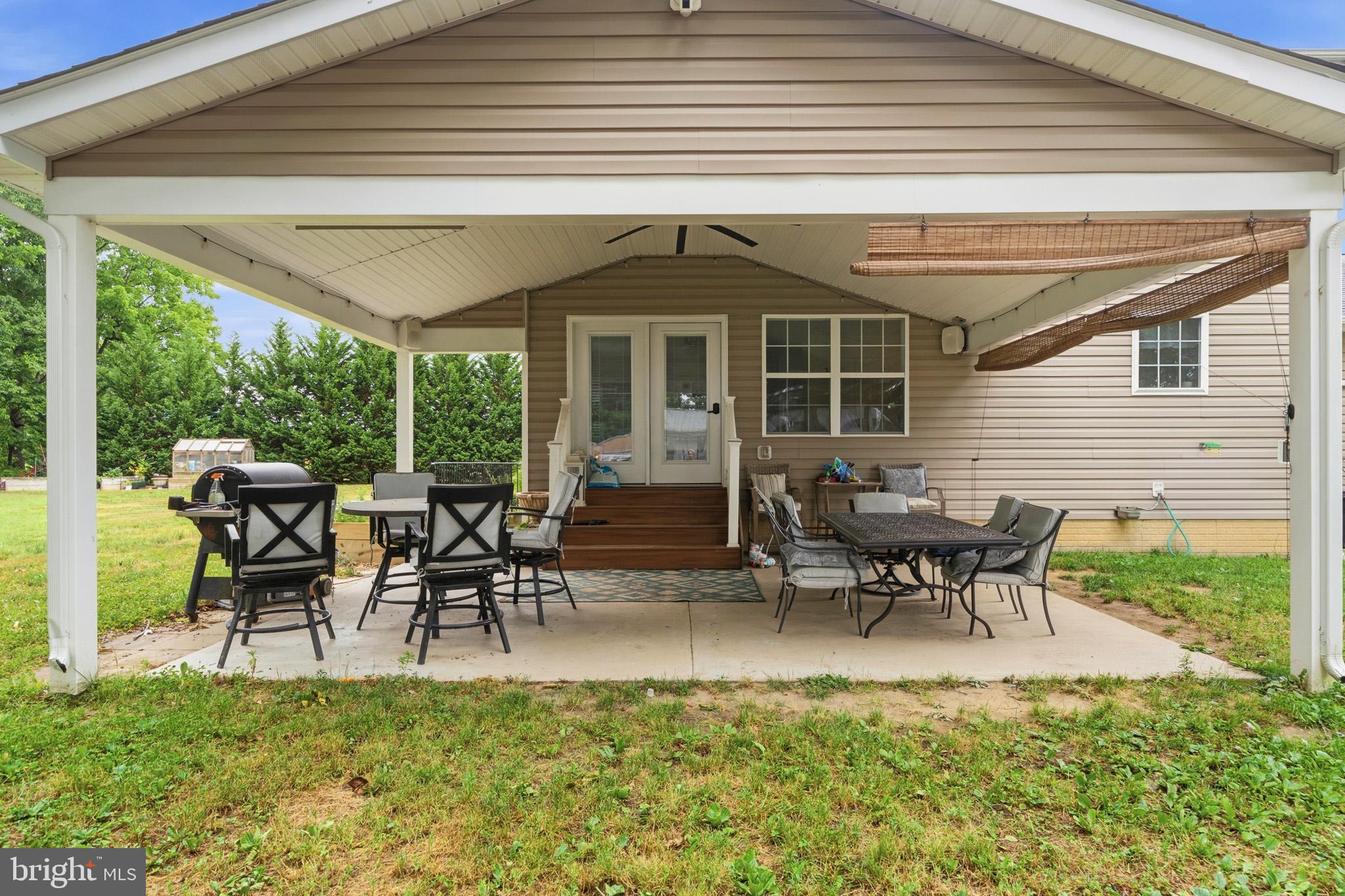 38970 Reeves Road Mechanicsville, MD 20659 - Photo 37 of 47 Relax, dine, and entertain under cover.