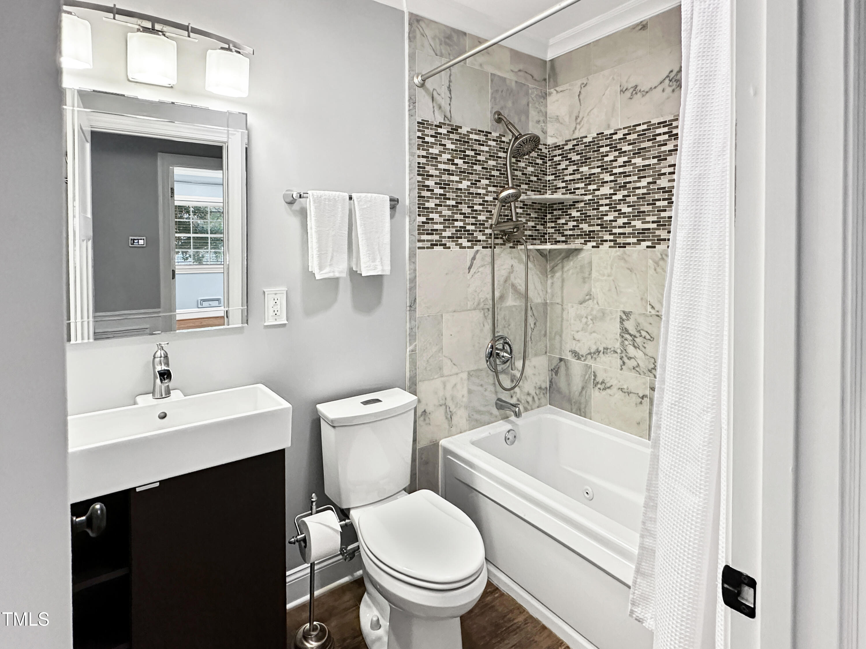 1318 Mayfair Road Raleigh, NC 27608 - Photo 26 of 52 Hallway Full Bathroom