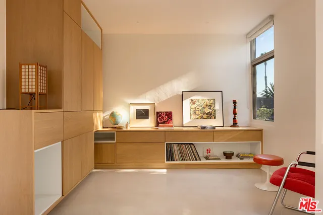 a view of a workspace with furniture