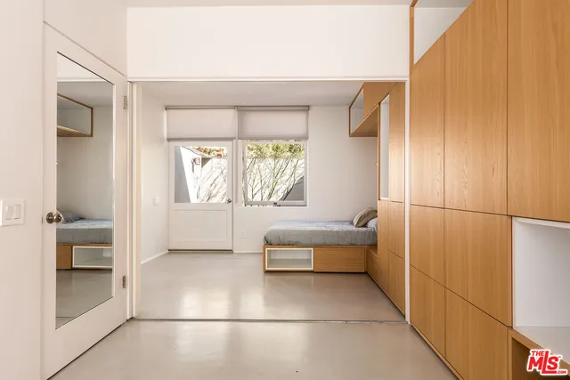 a bathroom with a tub and a window