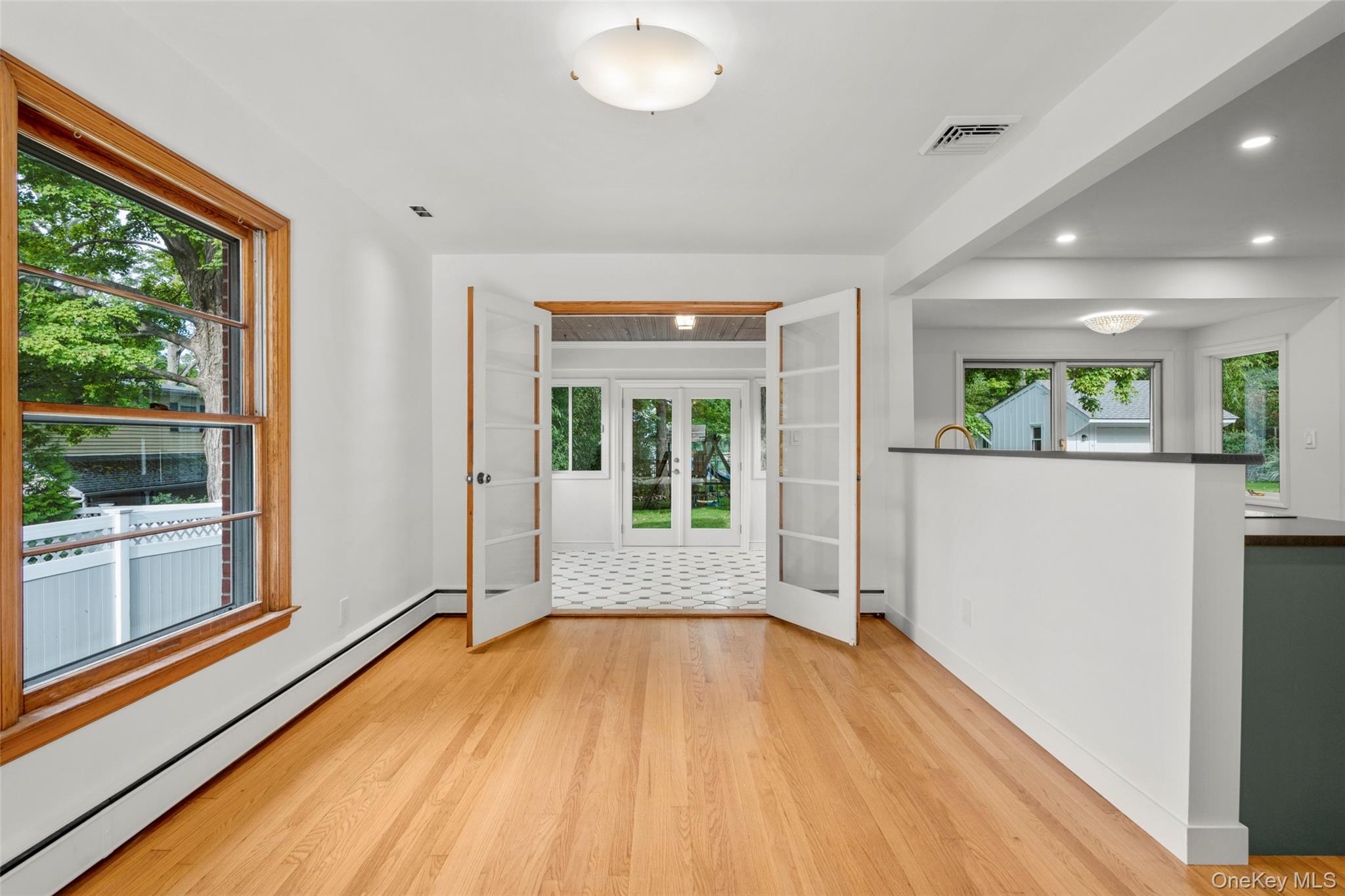 1 Craigside Drive Cold Spring, NY 10516 - Photo 7 of 36 Dining area opening in to the sunroom