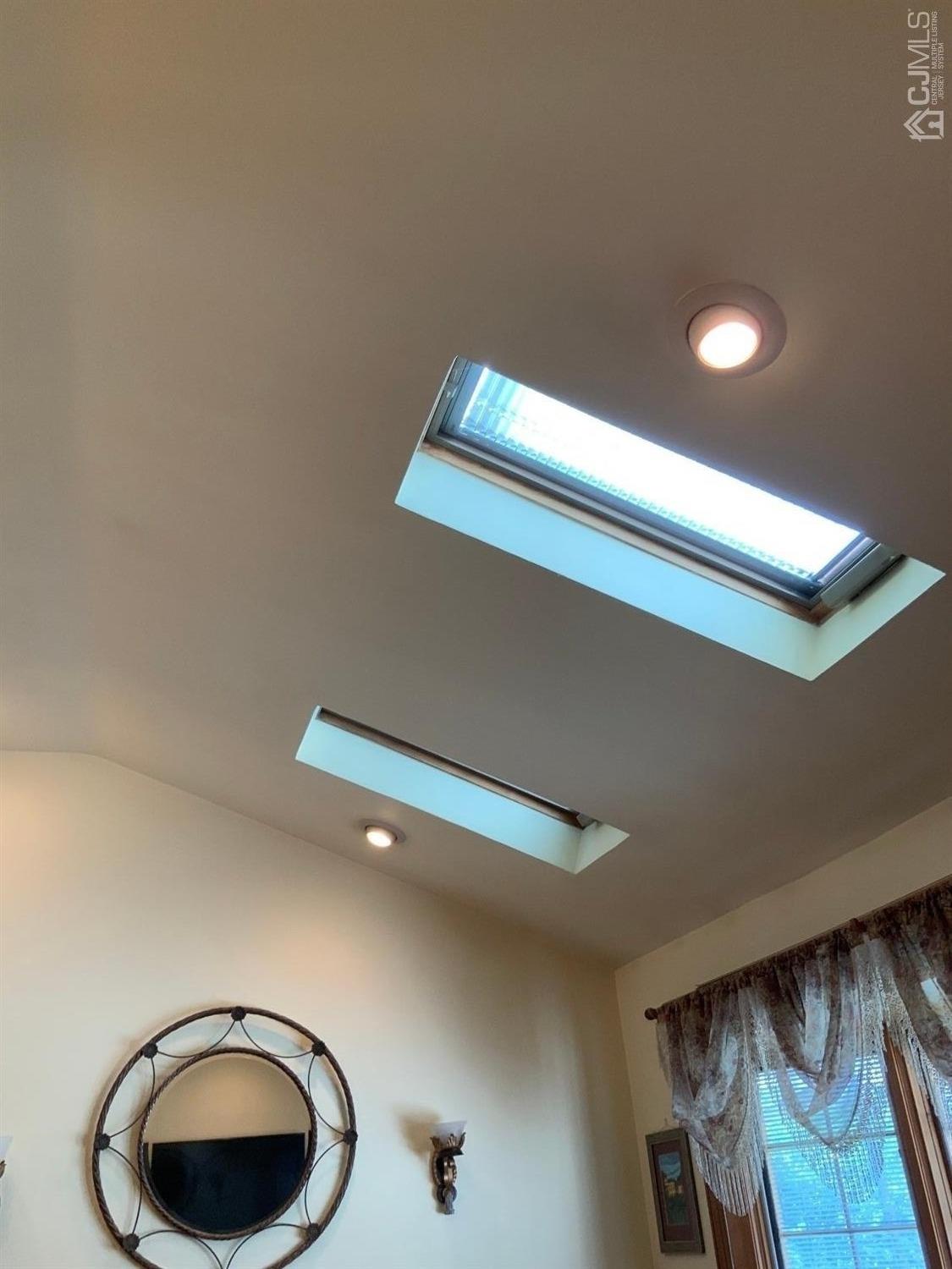 25 Penn Street Fords, NJ 08863 - Photo 17 of 20 a bathroom with a sink and mirror