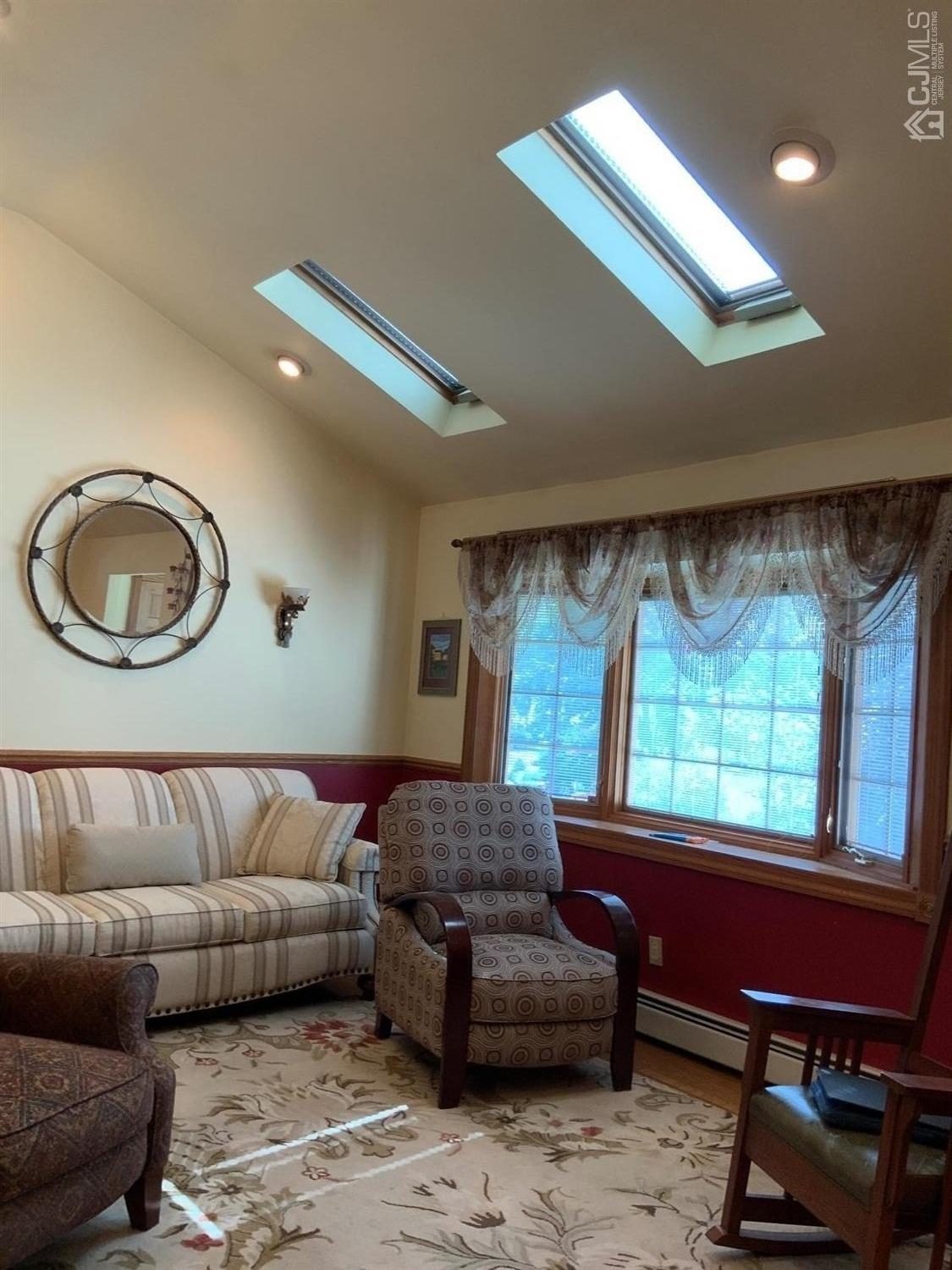 25 Penn Street Fords, NJ 08863 - Photo 10 of 20 a living room with furniture and a large window
