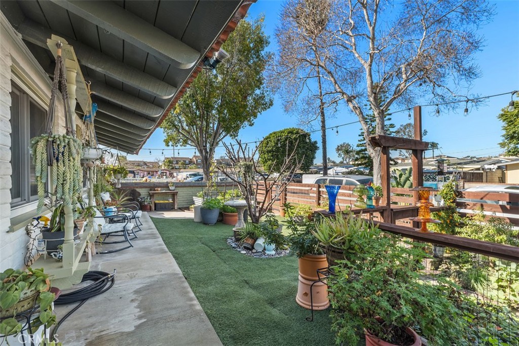 20292 Riverside Drive Newport Beach, CA 92660 - Photo 15 of 23 a view of a porch with a patio