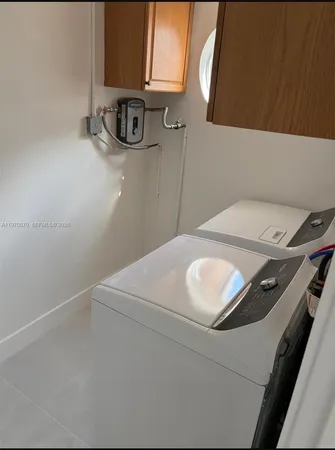 a close up view of washer and dryer
