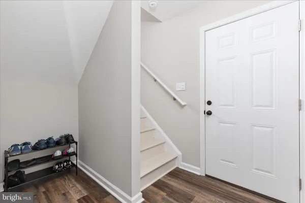 a view of a hallway with staircase