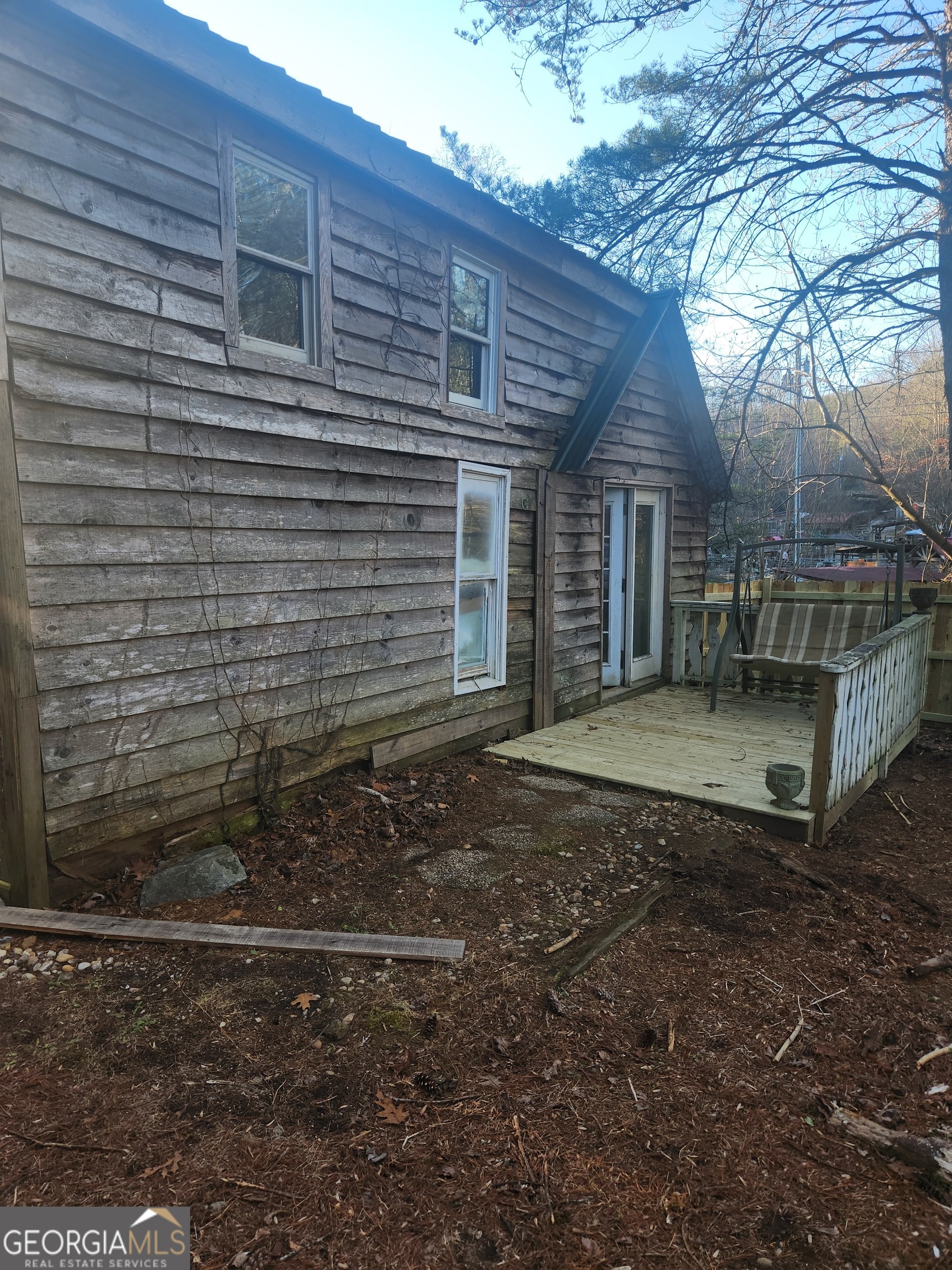 2911 Paradise Valley Road Cleveland, GA 30528 - Photo 7 of 8 a backyard of a house