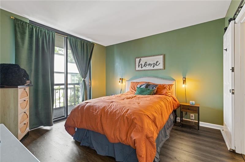 3481 Lakeside Drive Northeast, Unit 901 Atlanta, GA 30326 - Photo 11 of 38 a bedroom with a bed and a window