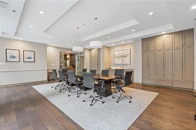 a view of a workspace with furniture