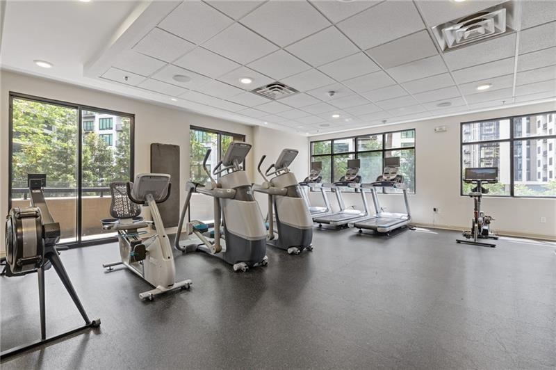 3481 Lakeside Drive Northeast, Unit 901 Atlanta, GA 30326 - Photo 28 of 38 a view of a room with gym equipment