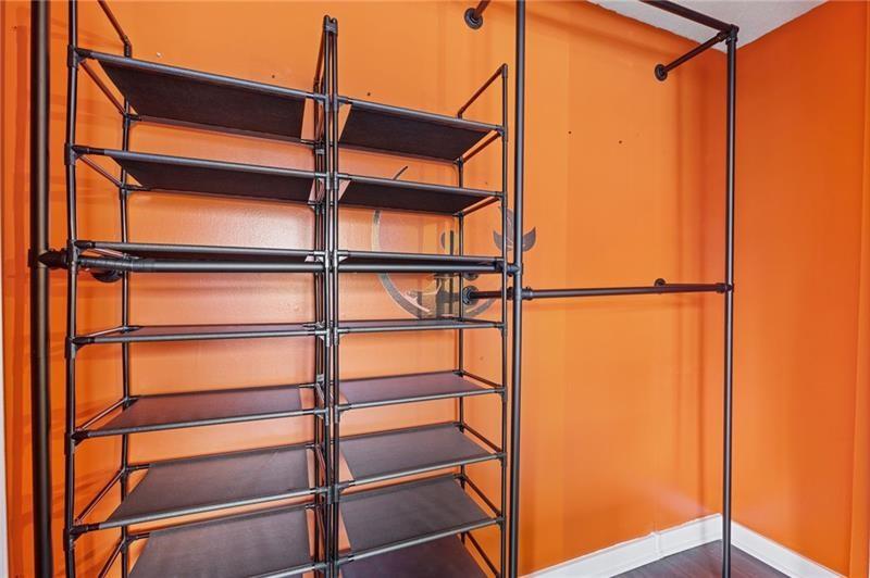 3481 Lakeside Drive Northeast, Unit 901 Atlanta, GA 30326 - Photo 3 of 38 a view of a room with racks on the wall