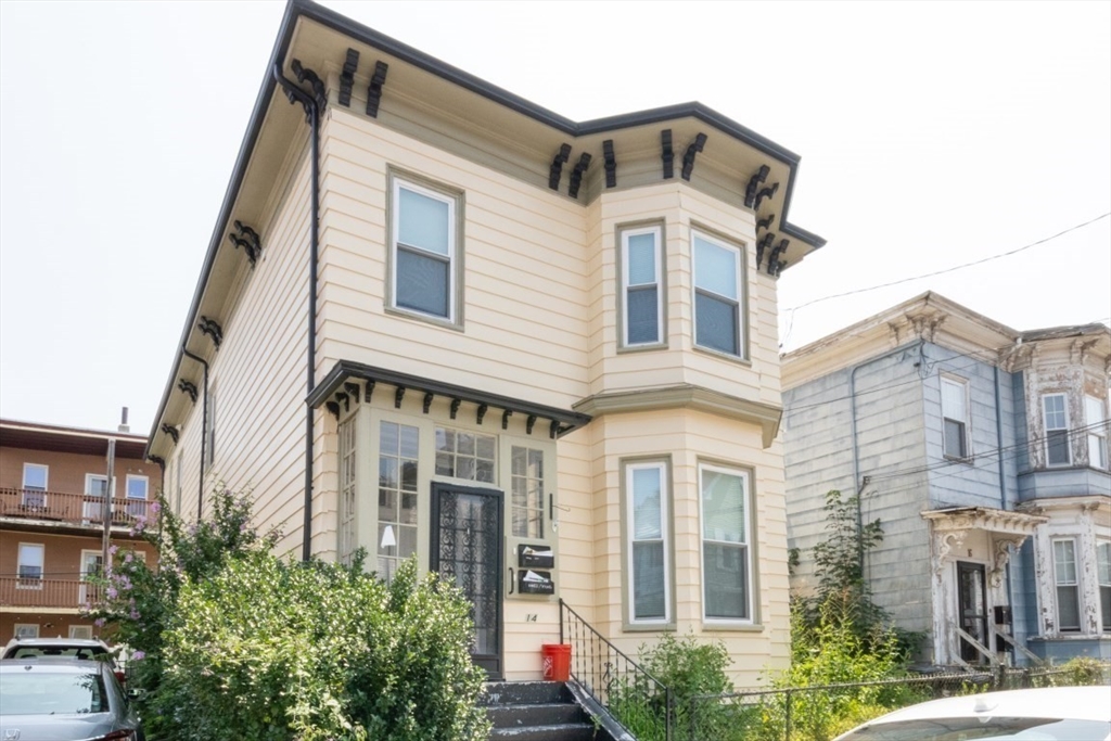 14 Grant Street Boston, MA 02125 - Photo 16 of 17 a front view of a house with a yard