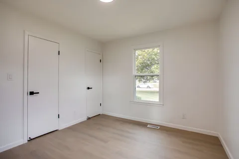 a view of a window in an empty room