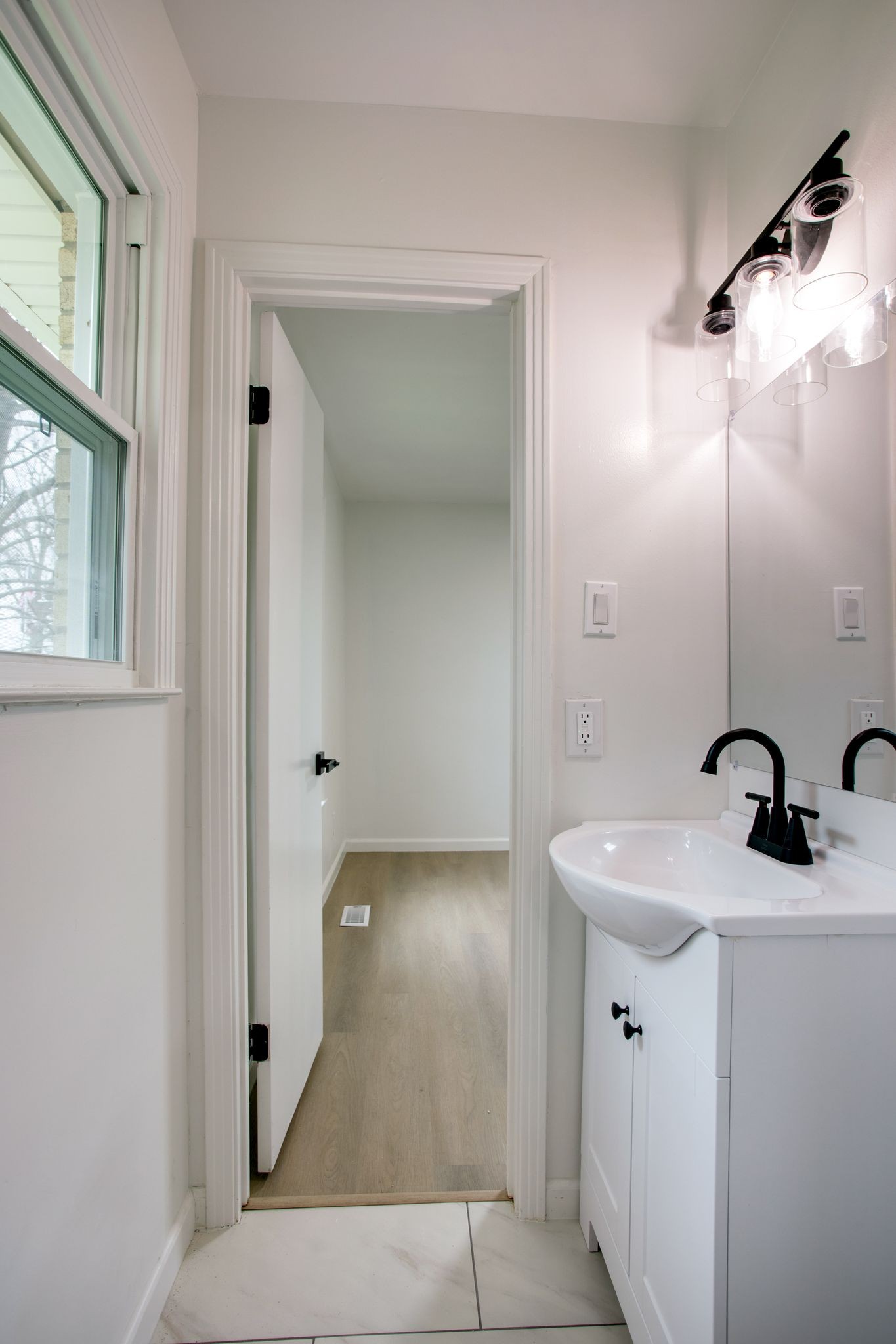 223 Hampton Road Columbia, TN 38401 - Photo 22 of 38 a bathroom with a sink and mirror