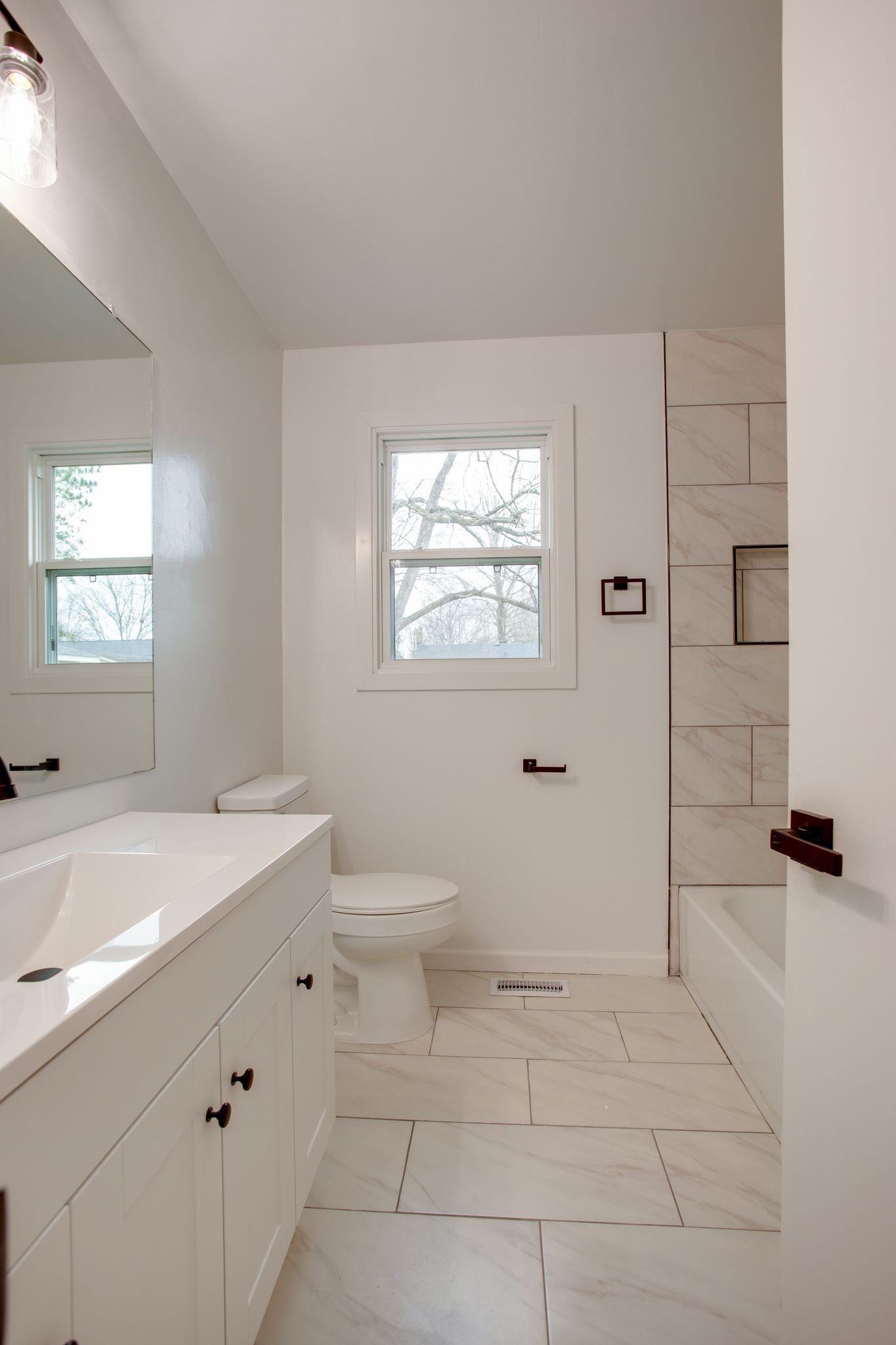 223 Hampton Road Columbia, TN 38401 - Photo 27 of 38 a bathroom with a sink a toilet and window