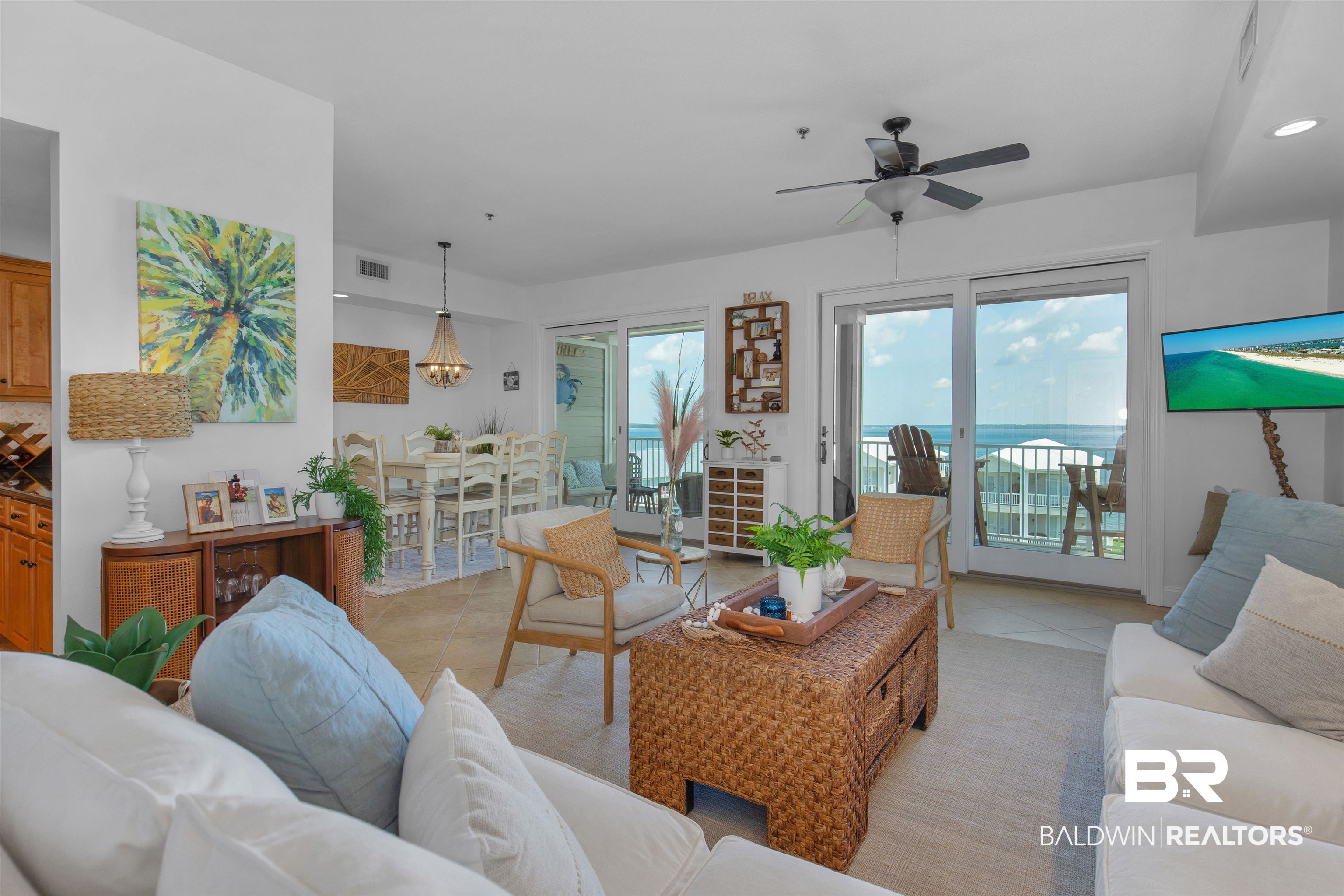 25909 Canal Road, Unit 301 Orange Beach, AL 36561 - Photo 5 of 43 Tiled living room with ceiling fan