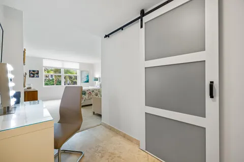 a workspace with furniture and window