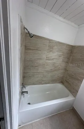 a bathroom with a bathtub